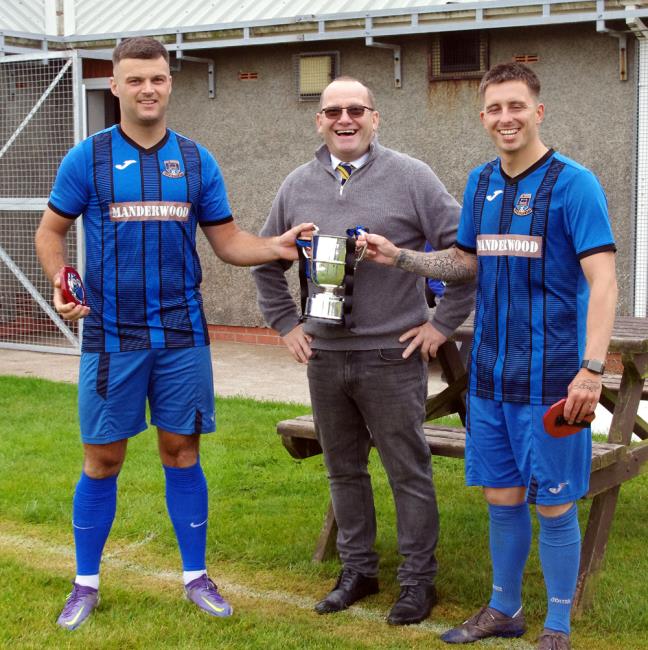 League Council chairman Ceri Morgan (centre) presents the silverware to Ashley Bevan (left) and Justin Harding (right)